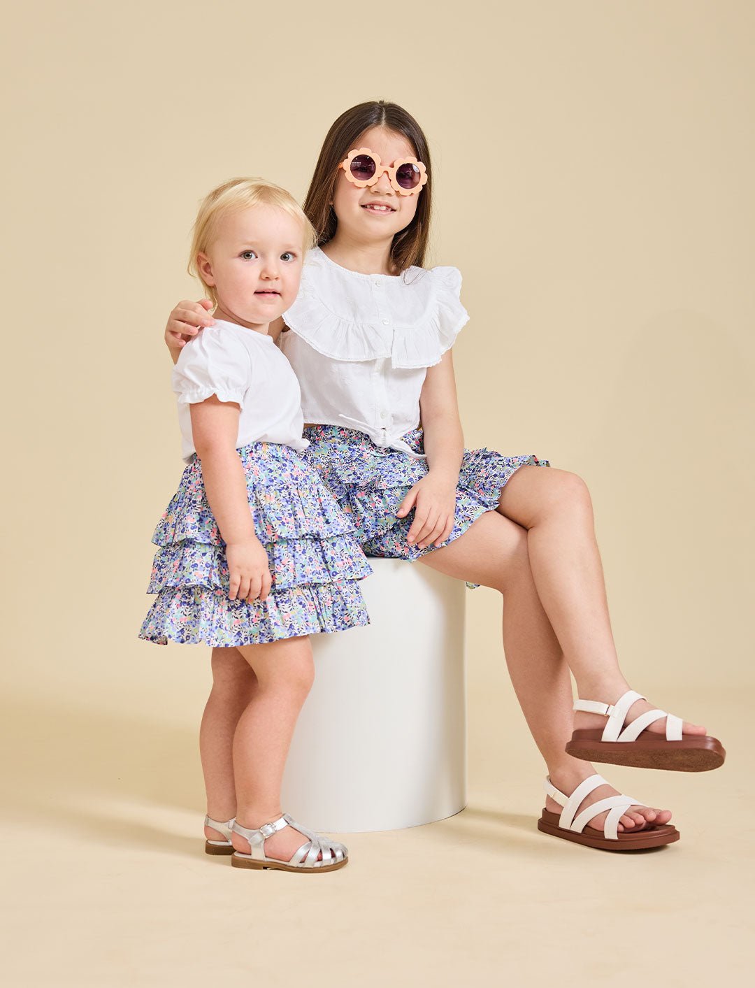 Two girls modelling the Odette liberty print skirt - ce-jour la