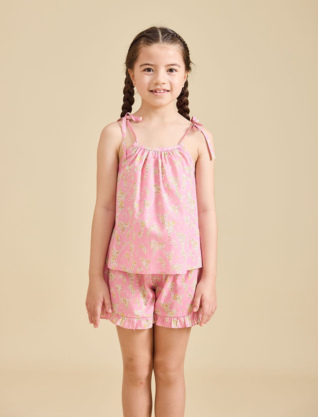 Girl modelling the Rosalie Set in pink Liberty fabric for girls aged 2-8 - Ce Jour-La