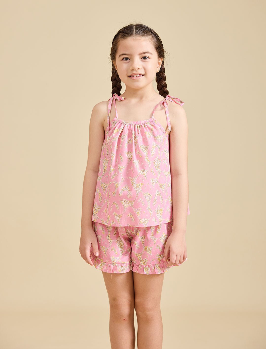Girl modelling the Rosalie Set in pink Liberty fabric for girls aged 2-8 - Ce Jour-La