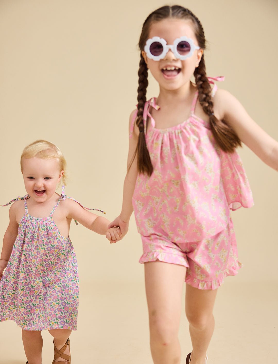 Girl modelling the Rosalie Set in pink Liberty fabric for girls aged 2-8 - Ce Jour-La