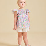A girl modelling the beatrix top - ce-jour la