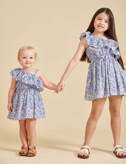 two girls wearing the Daisy dress holding hands - ce-jour la