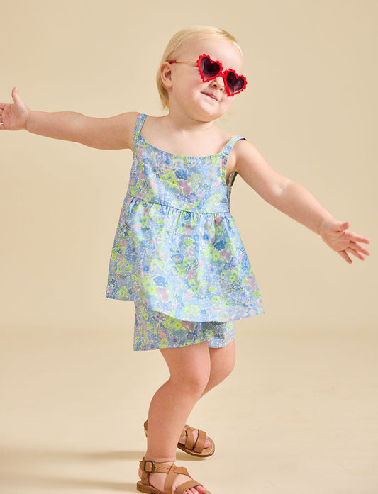 Girl wearing heart sunglasses modelling the delilah liberty print set - ce-jour la