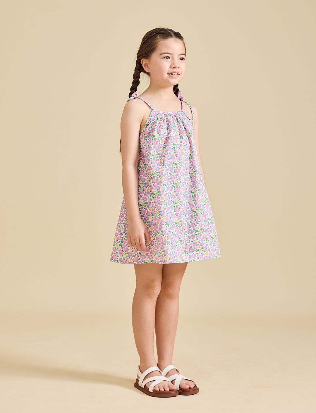 Girl wearing Fleur dress in Liberty fabric for girls age 2-8
