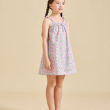 Girl wearing Fleur dress in Liberty fabric for girls age 2-8