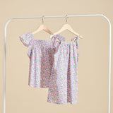 The fleur dress and top hanging from a clothes rail
