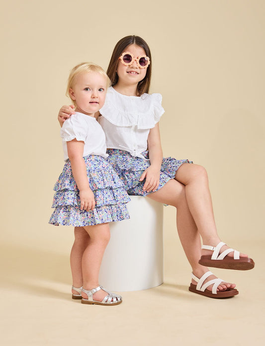 Two girls modelling the Odette liberty print skirt - ce-jour la
