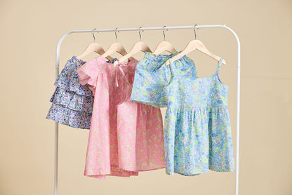 A selection of liberty print dresses on a clothes rail from ce-jour la