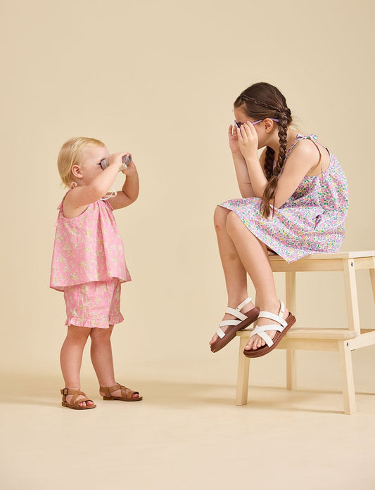 Girl wearing the Rosalie Set in pink Liberty fabric for girls aged 2-8 - Ce Jour-La