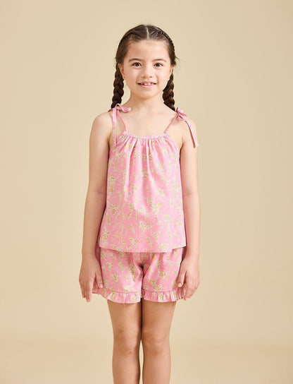 Girl modelling the Rosalie Set in pink Liberty fabric for girls aged 2-8 - Ce Jour-La