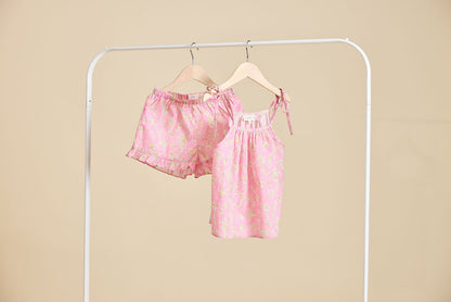 The Rosalie set in Pink hanging from a clothing rail