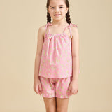 Girl modelling the Rosalie Set in pink Liberty fabric for girls aged 2-8 - Ce Jour-La