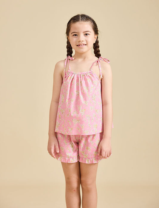 Girl modelling the Rosalie Set in pink Liberty fabric for girls aged 2-8 - Ce Jour-La