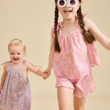 Girl modelling the Rosalie Set in pink Liberty fabric for girls aged 2-8 - Ce Jour-La